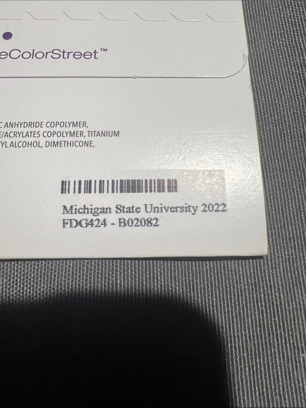 Michigan State University logo , nail polish strips.
